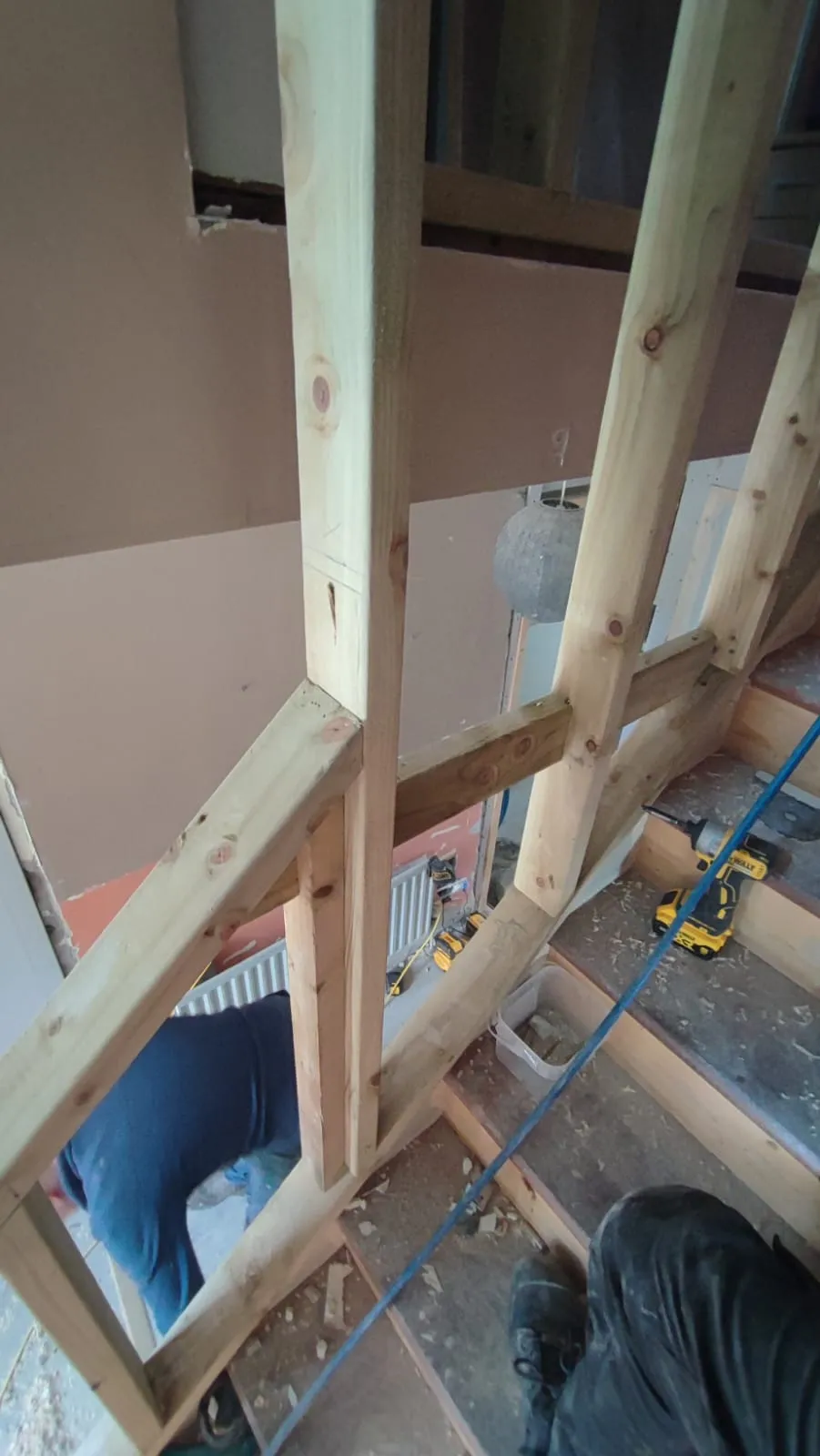 Staircase cladding in progress, solid oak treads being fitted over existing structure, Setanta Woodcraft Co. Louth